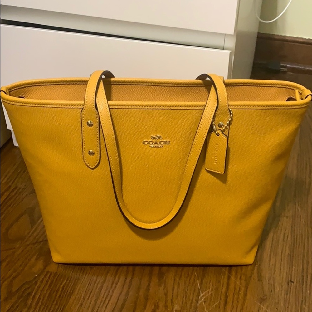 Large mustard Coach tote